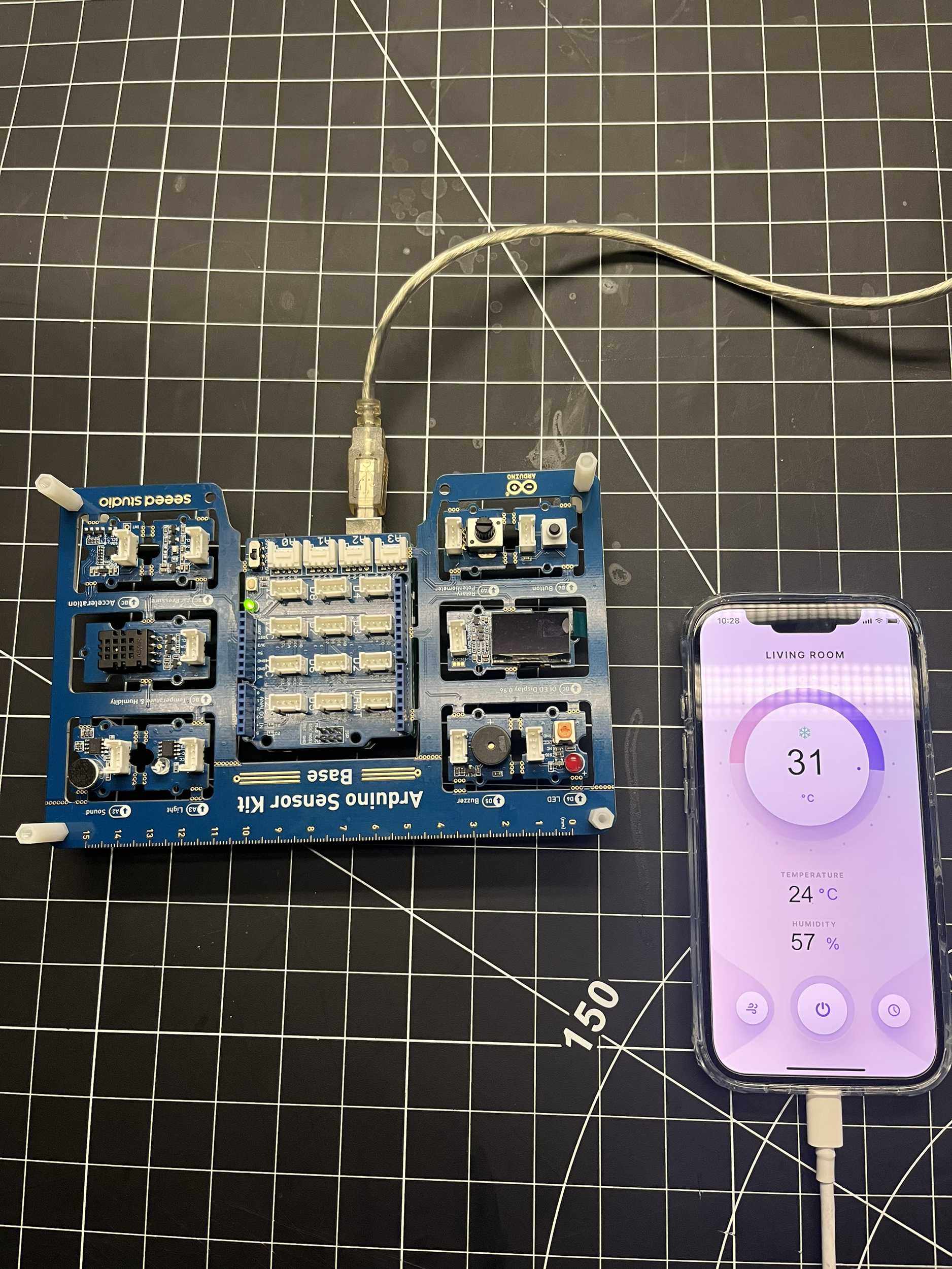Here we can finally see that after connecting everything and putting in the right code that the phone, Arduino and ProtoPie are working along together to show the degrees and humidity rate.